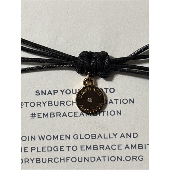 Tory Burch Foundation Embrace Ambition Bracelet Black
with Gold Tone Logo Accent - Picture 3 of 4